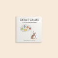 Scribble Scrabble: Un libro de cartón con las primeras palabras