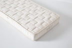 Dream No. 1 Mattress top-down corner view with rectangular grid tufting and Kalon branding stitched on the side ticking.