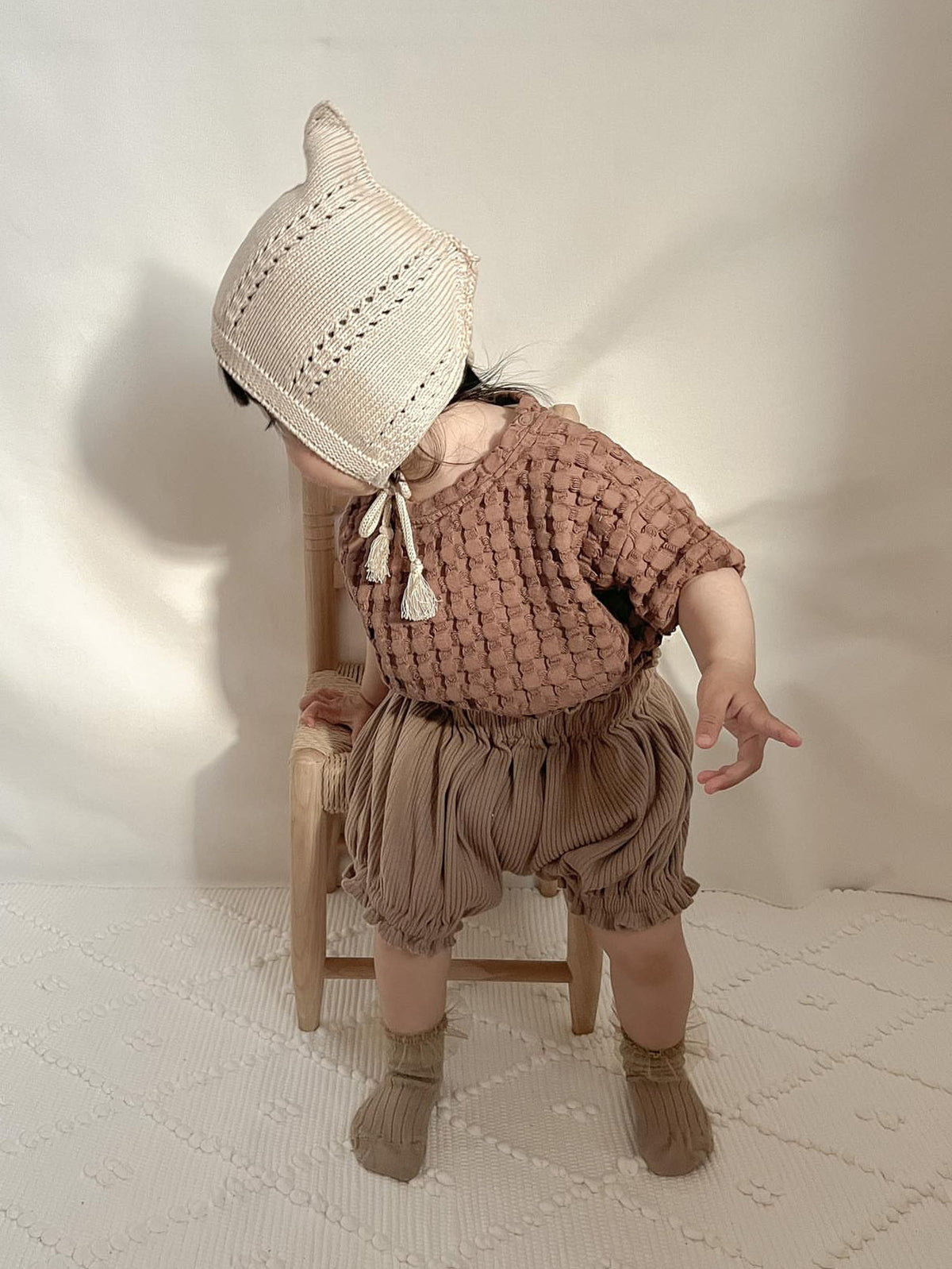 El bebé con gorro de gnomo