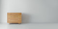 Caravan Dresser in white oak, off-center to the left in a wide format frame, white studio floor and pale grey wall.