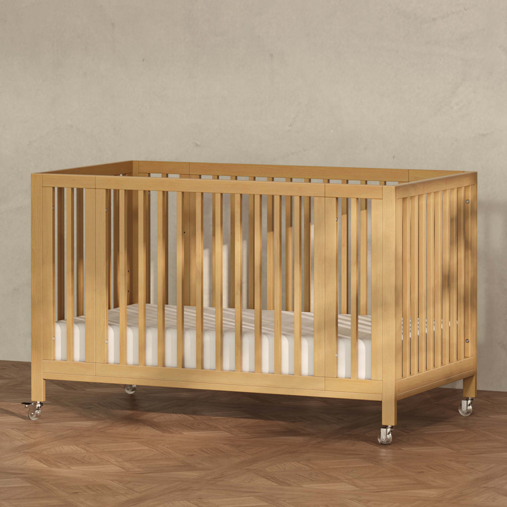 Rolli 9-in-1 Convertible All-Stages® Crib with Bassinet & Toddler Bed Conversion Kits