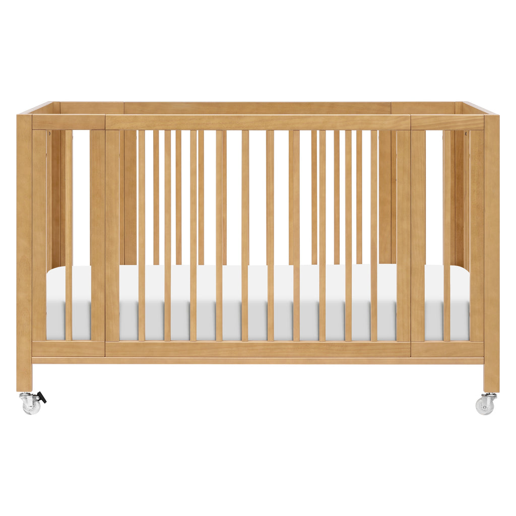 Rolli 9-in-1 Convertible All-Stages® Crib with Bassinet & Toddler Bed Conversion Kits