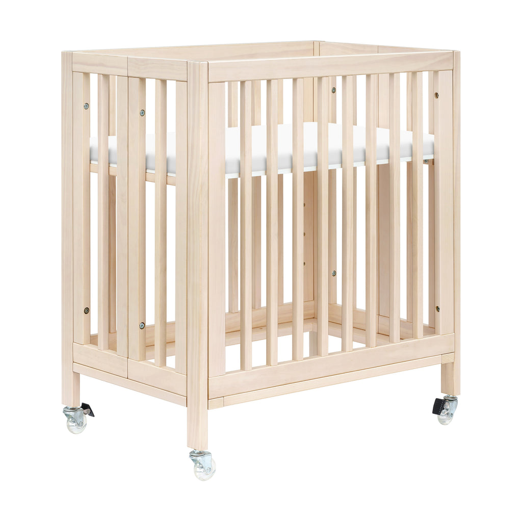 Rolli 9-in-1 Convertible All-Stages® Crib with Bassinet & Toddler Bed Conversion Kits