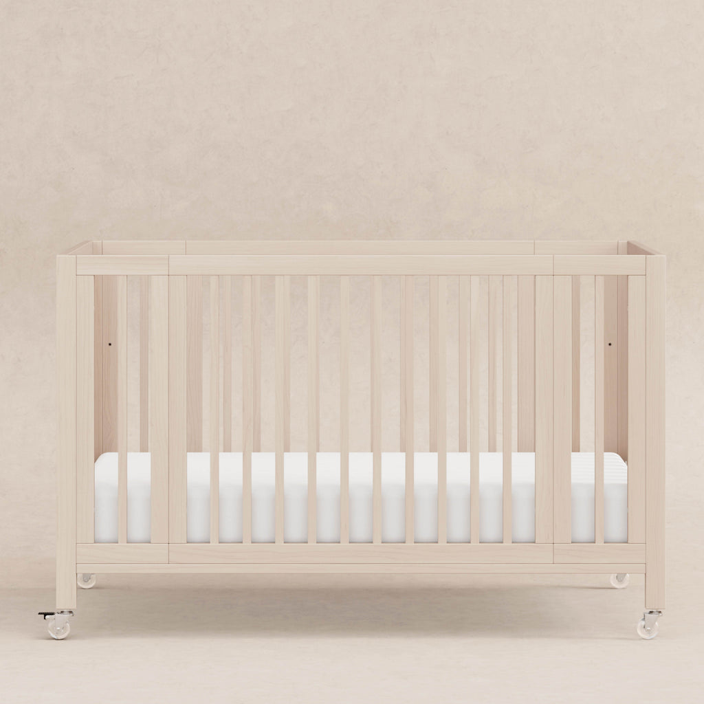 Rolli 9-in-1 Convertible All-Stages® Crib with Bassinet & Toddler Bed Conversion Kits