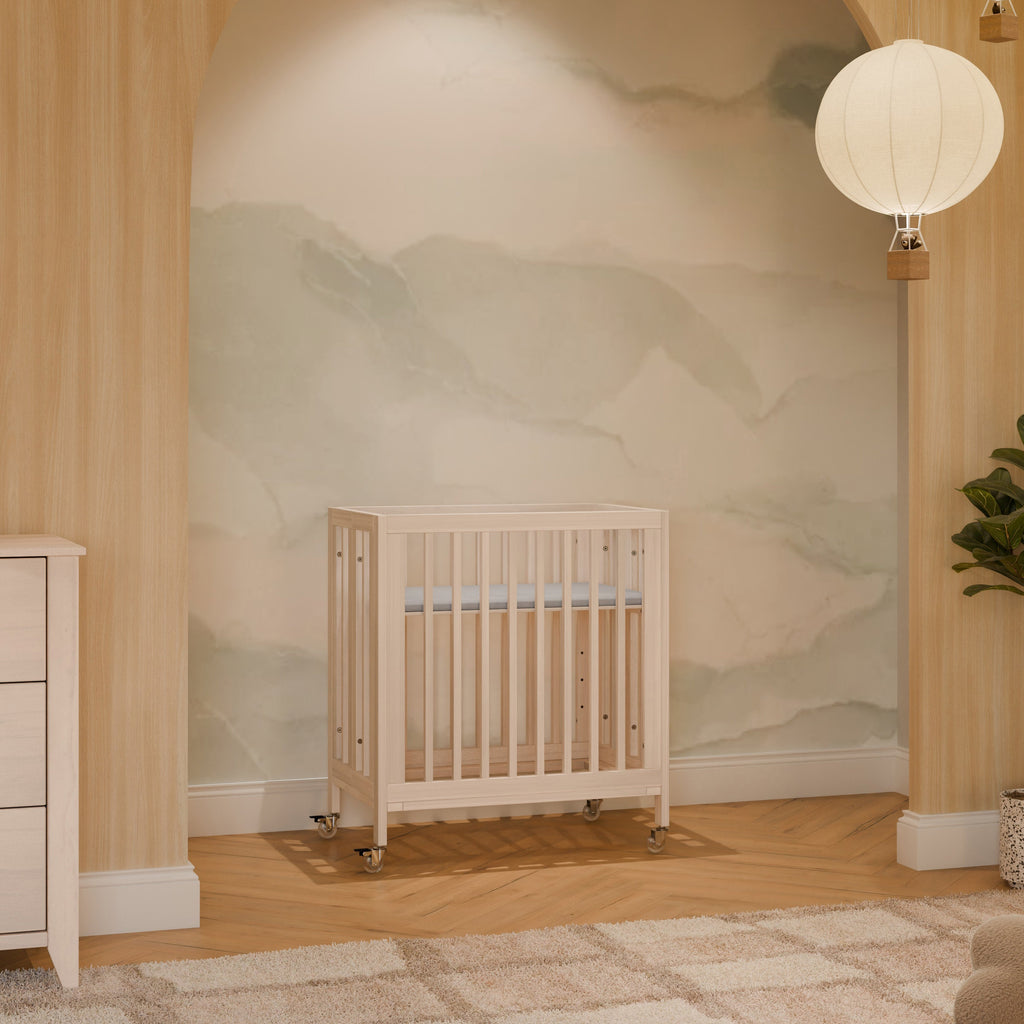 Rolli 9-in-1 Convertible All-Stages® Crib with Bassinet & Toddler Bed Conversion Kits