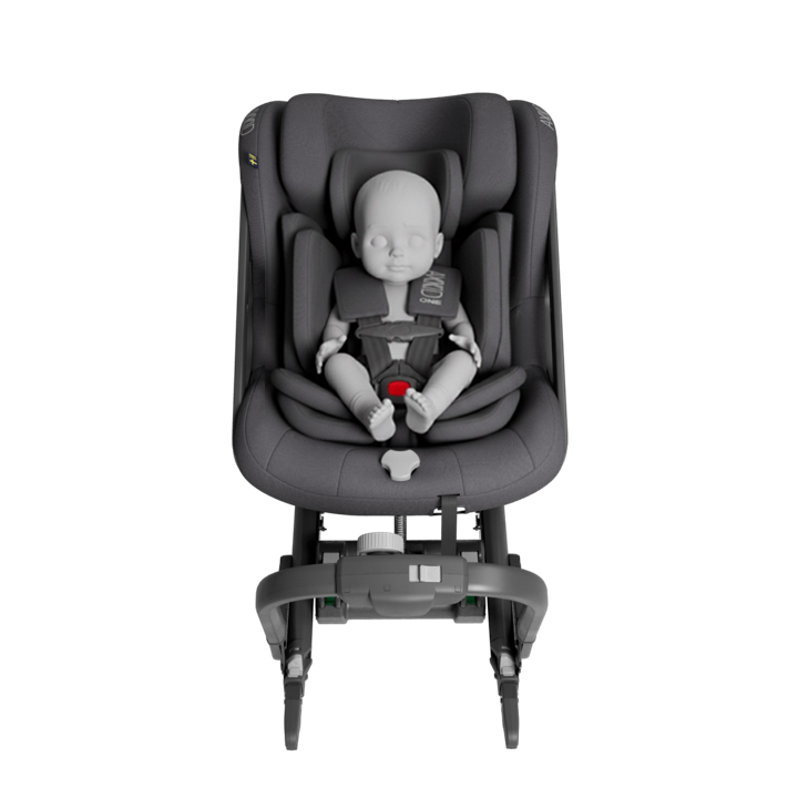 Infant harnessed in the Axkid ONE 3 with the infant insert