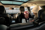 Child rear-facing in the Axkid ONE 3 on a family drive