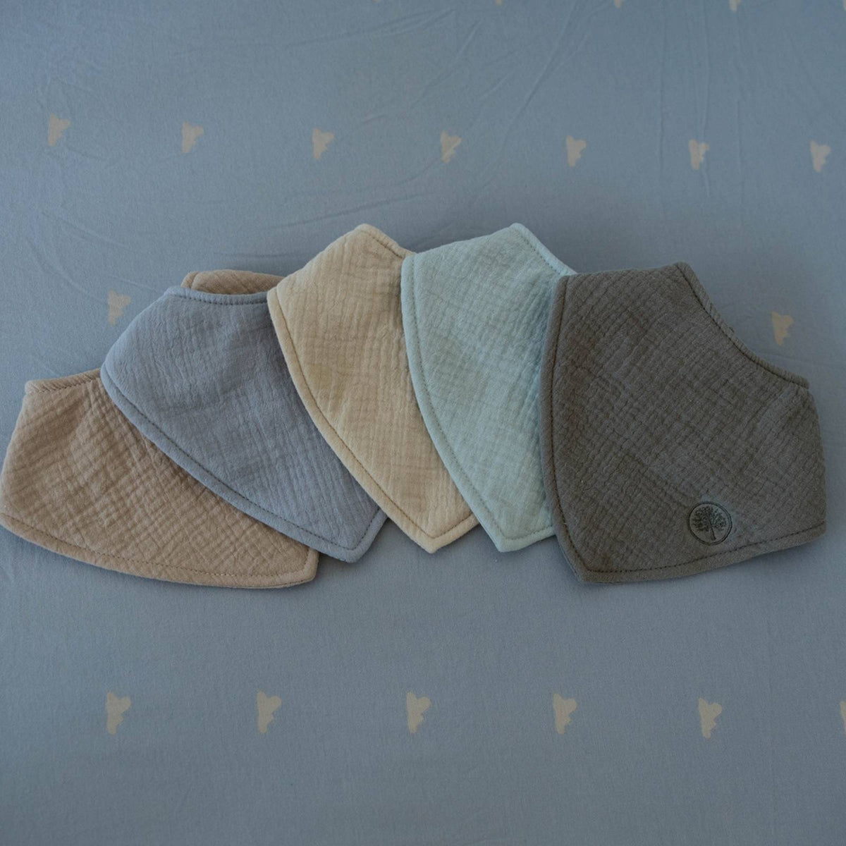 Set de baberos tipo bandana de muselina (paquete de 4)