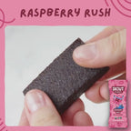 Skout Organic Kids Fruit Bar Variety Pack - Close-up of a Raspberry Rush Kids Snack Bar being pulled apart to show its soft, chewy interior.