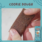 Skout Organic Cookie Dough Kids Bar - Close-up of a Cookie Dough Kids Snack Bar being pulled apart to show its soft, chewy interior with chocolate chip pieces.