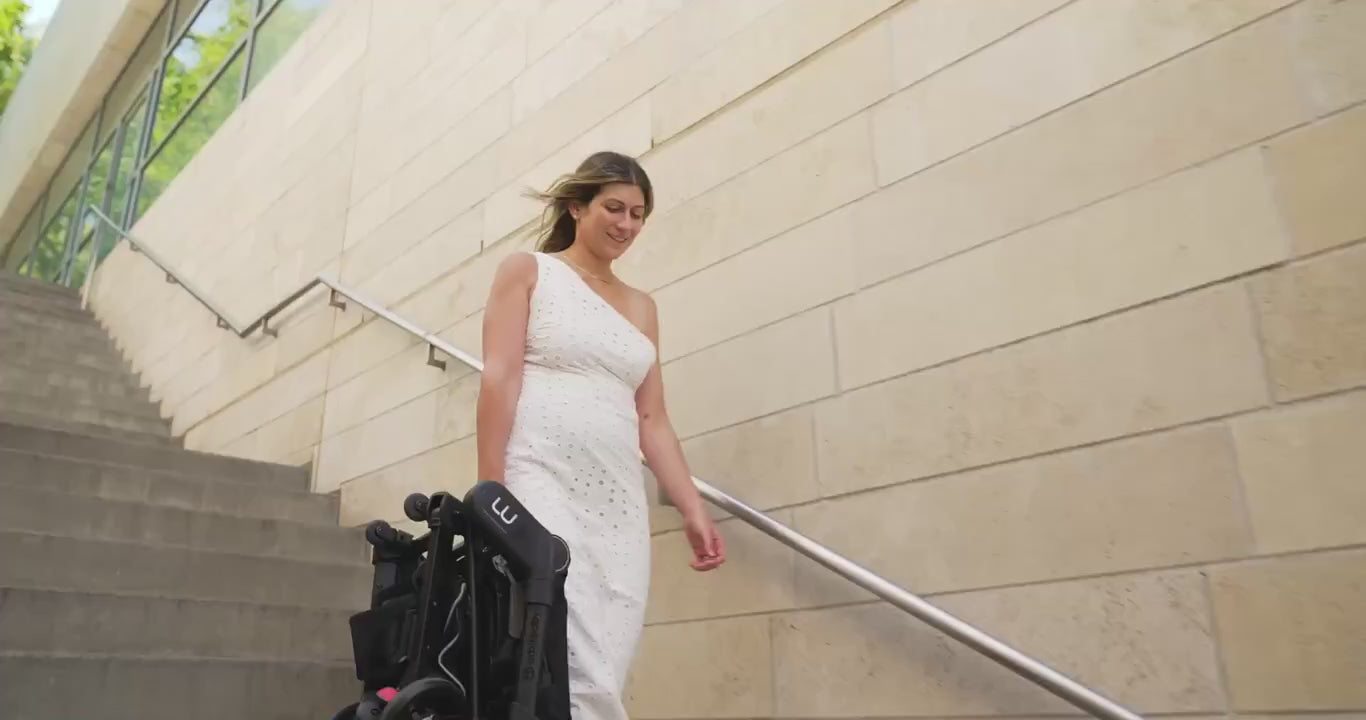 M+ Stroll & Lounge Compact Travel System - video