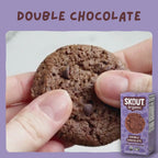 Skout Organic Double Chocolate Soft Baked Cookies - Close-up of a Double Chocolate Soft-Baked Cookie being pulled apart to show its soft, chewy interior and chocolate chips.